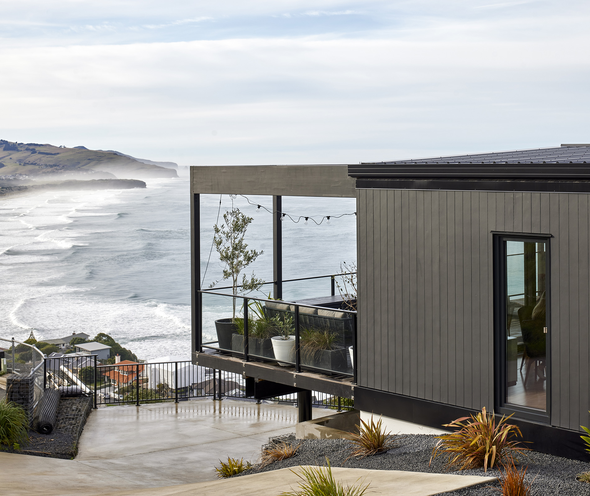 This striking black-clad home is designed for harsh coastal conditions