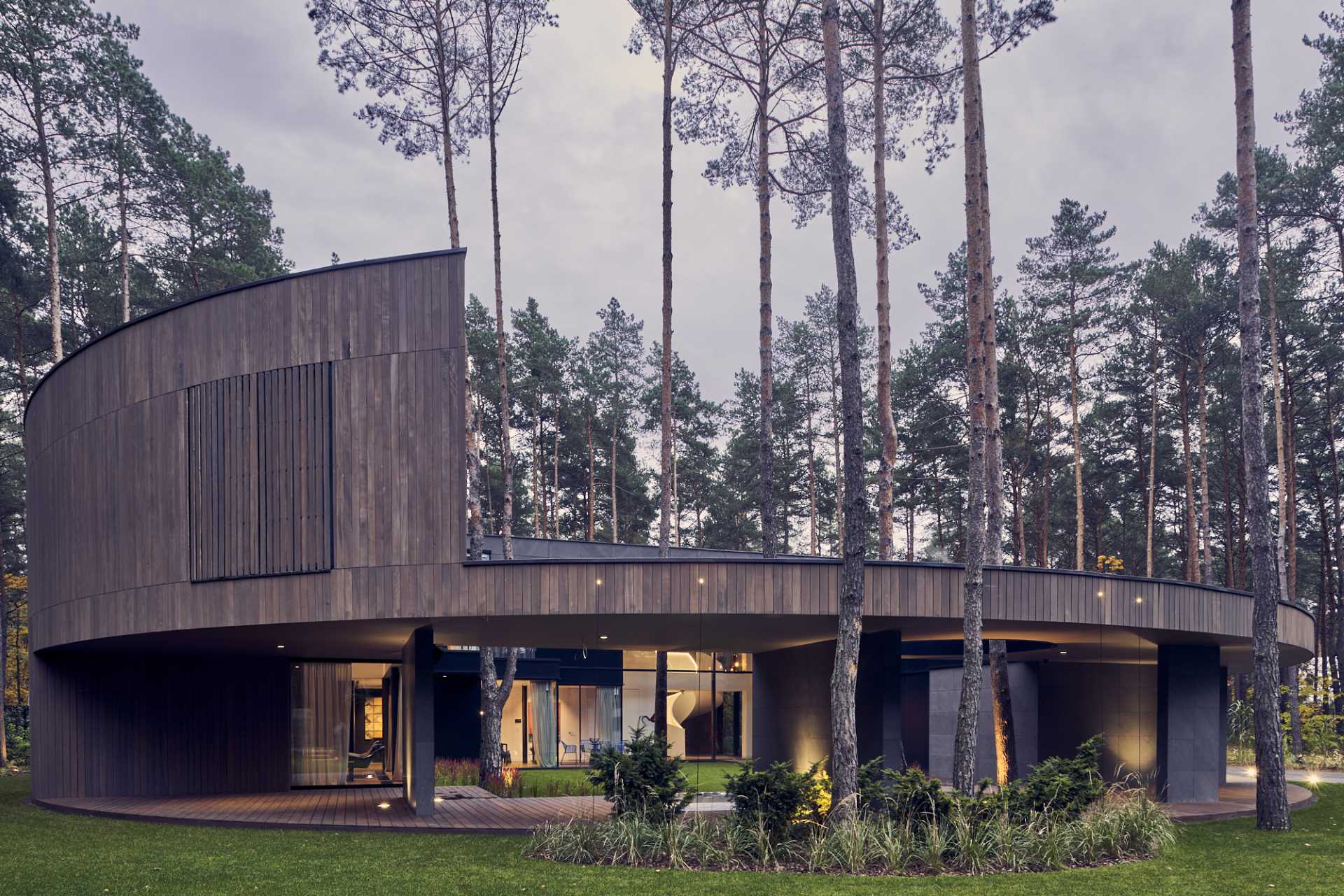 A Round House Design Inspired By A Tree Trunk | International design, Poland
